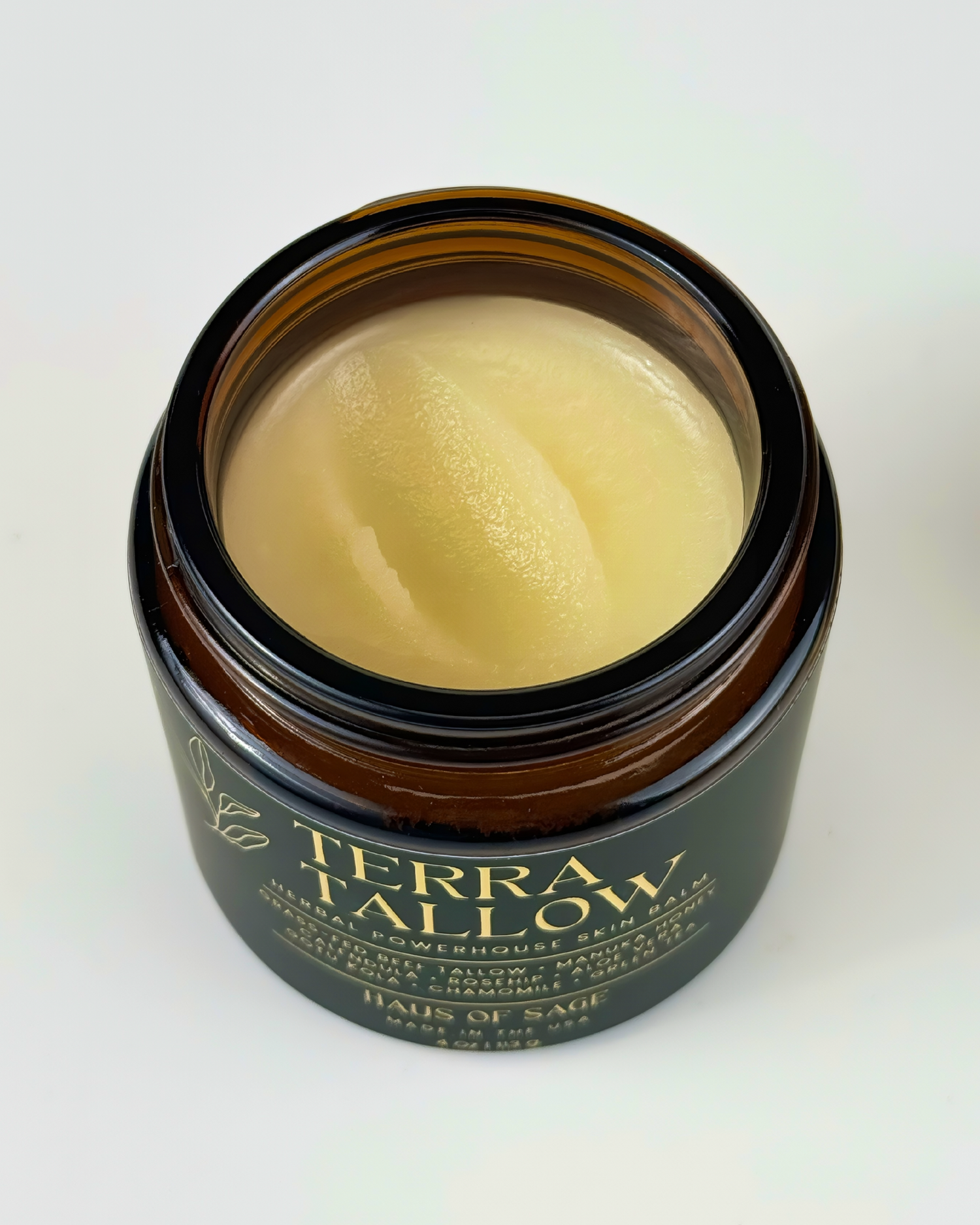Jar of Terra Tallow on a white background