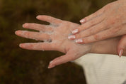 Close-up of hands with foaming bubbles