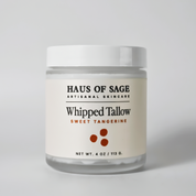 Jar of Haus of Sage Whipped Tallow Sweet Tangerine on a light gray background