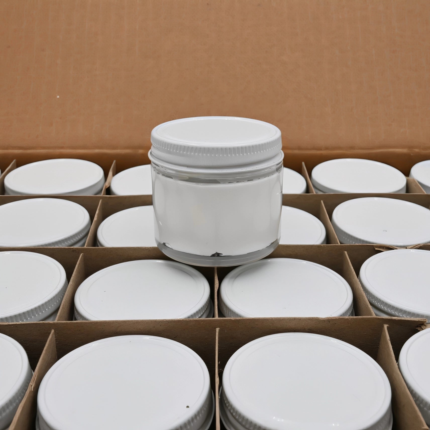 carton of cream jars