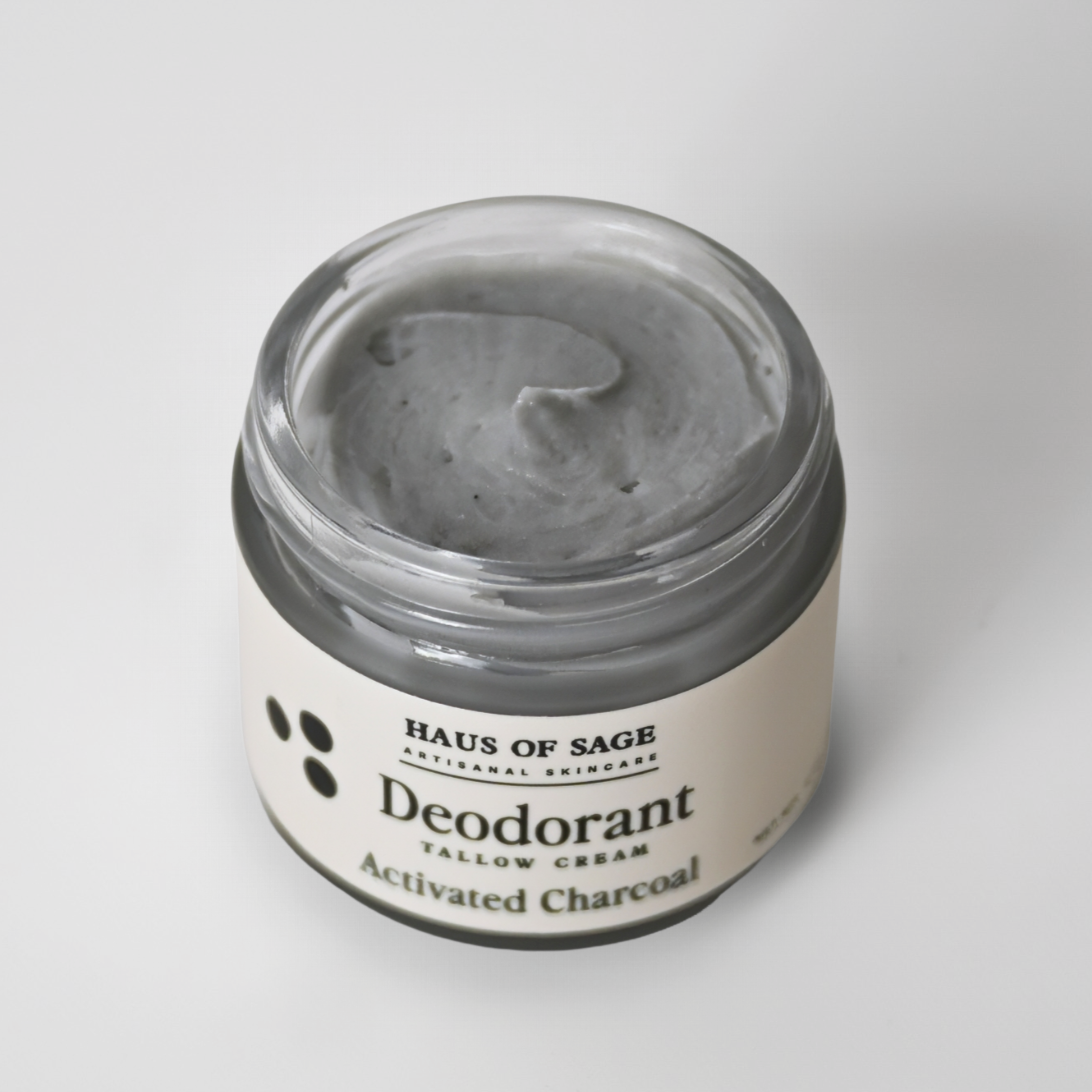 Jar of Haus of Sage activated charcoal deodorant on a light gray background