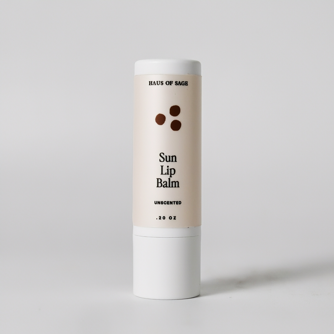 Sun lip balm container with 'Haus of Sage' branding on a light gray background